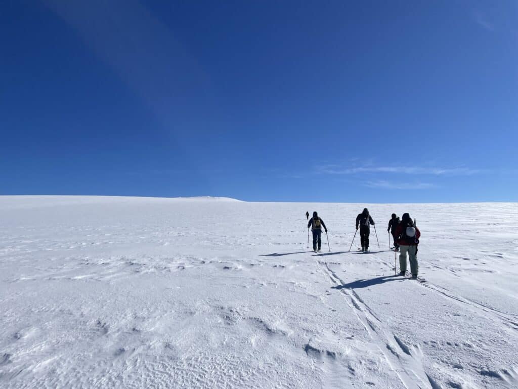 Skiing uphill in Finnmark, Norway.